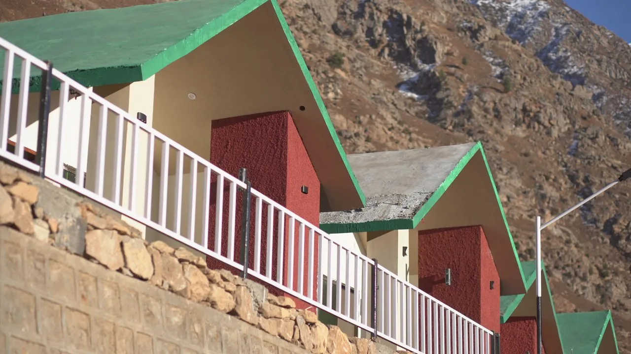 Cottages against the mountainside